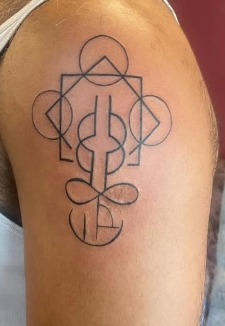 Fine line geometric minimal tattoo by PRANA Tattoo and Piercing Studio in Vellore